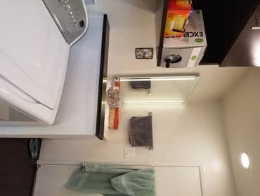 V. Jones Bathroom/Laundry Room Remodel - Tub to Step-in Shower Conversion with Linear Drain
- New Vanity, Toilet, Sink, mirror, toiletries
- All new fl