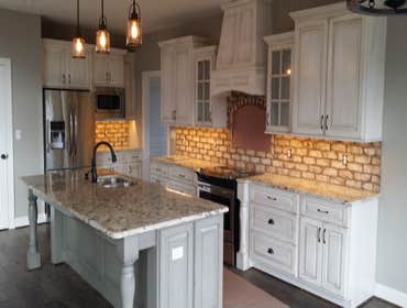 Custom kitchen Forest Va Custom kitchen paint Designer White with Pewter glaze finish. Island painted Everclassic with Black glaze finish. Custom in ho