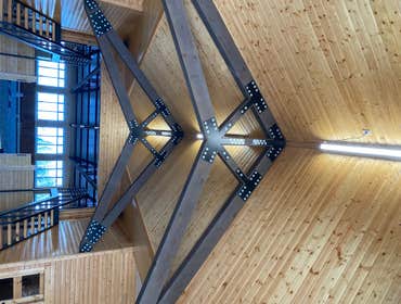 Photos by Unlimited Home Solutions #1 Horse arena, trimmed windows with pine, installed T and G pine shiplap on walls and ceilings.