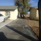 Photos by Concrete With Love, Inc #1 Closed open carport into ,single car garage