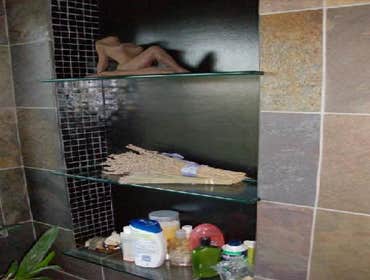Tempered glass shelves with recycled glass tiles