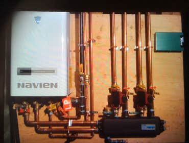 New on demand heating system with hydrostatic cast iron seperater
