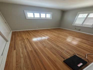 Photos by Floormasters & Design #1 Hardwood floor sanding and refinishing with some repairs.