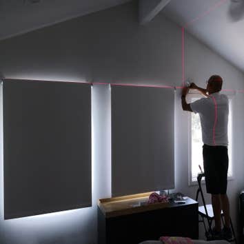 Laser Installation of blackout Roller Shades