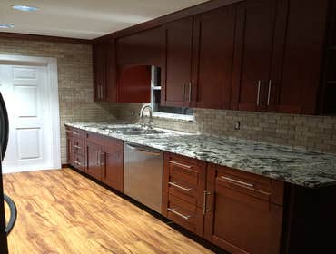 Dark wood shaker kitchen.