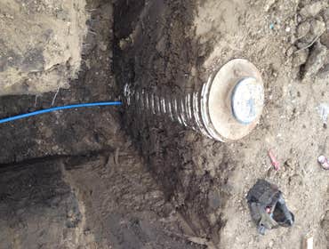 Water line hooked to meter pit