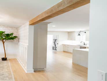 Photos by Albrecht, LLC #1 Through strategic space planning, thoughtful material selections, and custom craftsmanship, this first-floor renovation tran