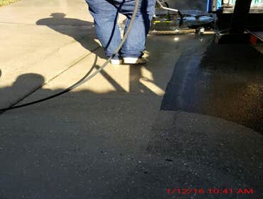 Photos from Popa Construction LLC Before & Afters of a soft wash roof cleaning and driveway and side walk cleaning.