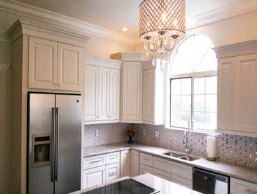 White On White Kitchen Client wanted a White on White kitchen.
We reconfigured the layout of this kitchen adding a comfortable and big island in the 
