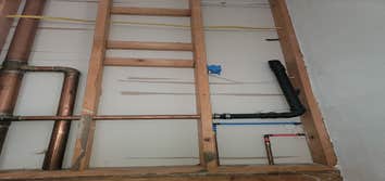 Photos by Sharp Edges Construction Llp #2 These home owners experienced a water loss, affecting both their upstairs and downstairs bathroom, main entra
