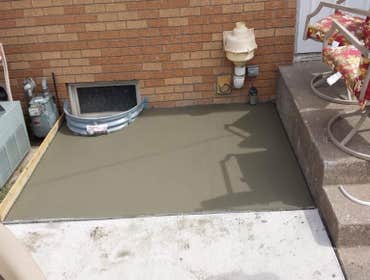 Sidewalk, patio extension, and ac pad Pour and finish sidewalk, patio extension, and ac pad.