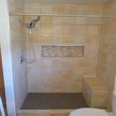 Complete shower remodel with niche and bench.