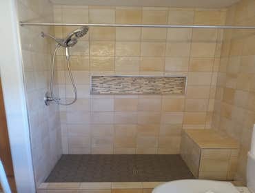 Complete shower remodel with niche and bench.