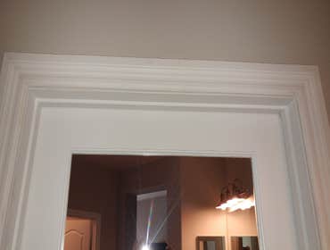 Photos by A&A Flooring Specialist, Inc. Dba One Source Construction #6 Master bath floor replacement with LVP waterproof flooring and wallbase and door