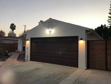 Stucco installation demolition, electric, lights, Stucco installation and paint.