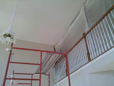 Custom House Repainted entire house. Removed popcorn ceilings and refinished smoothly.
