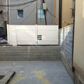 Philadelphia block retaining wall and concrete patio