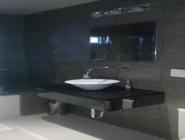 Beverly Hills Modern Bathroom This is a very beautiful, very modern bathroom complete with a Toto Neorest Toilet which does all the work for you, inclu