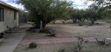 Thompson Pro Landscaping Project Simple clean up in Benson A.Z. It started as a one or two day clean up.From there stucco patch's on the house and demo