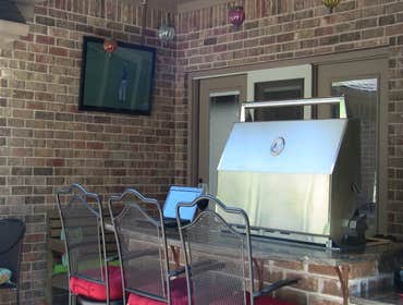 Cedar Garage Door and Backyard Kitchen