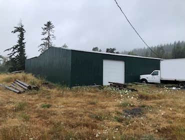 Photos by Zack of All Trades LLC #3 Reside and seal commercial building.