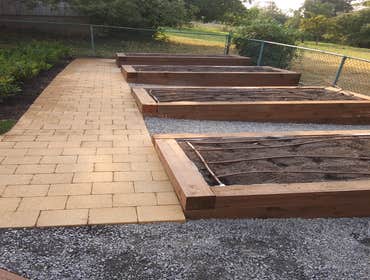Photos by Rc Healthy Lawns #1 Full yard restoration pavers, retaining walls, vegetable gardens, flower beds, sod, shrugs ,plants and trees.