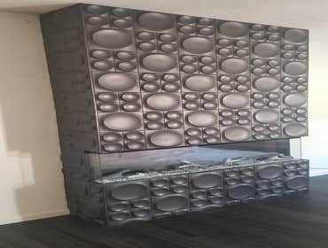 Fire place in a modern tile Fireplace in a custom tile