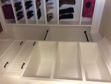 Custom Master Walk-In Closet Custom walk-in closet, designed and built from the ground up. Wainscot doors and draws, oil rubbed bronze drawer pulls and