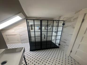 Photos by Oscar Tile LLC #2 Master Bathroom Remodel
From Tub to Shower Conversion
Heated Floor
Custom Shower Glass Door