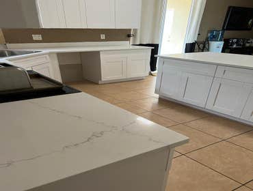 Photos by Dream Remodel Construction LLC #3 Kitchen Remodel + Vanities. Calacatta Quartz