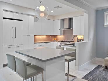 Kitchen Remodel This kitchen is a testament to modern sophistication and culinary elegance. From sleek cabinetry to luxurious countertop, this space se