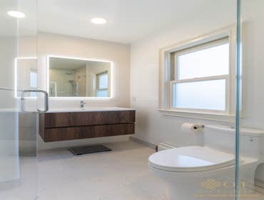 Photos by O.T Bay Builders-Guest Bathroom Walk in Shower Transforming our clients guest bathroom with a contemporary sleek walk-in shower. Clean lines,
