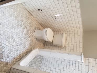 Subway Tile Shower And Marble Floor