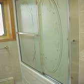 bathroom Bathroom remodel including shower, tile, toilet, cabinets, sink/counter, heated floor, lighting