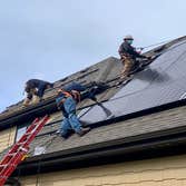 Photos by Rethink Electric Solar installation on a steep roof