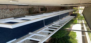 Photos by Saille's Construction #2 Steps going into porch were removed and replaced with a wheelchair ramp.