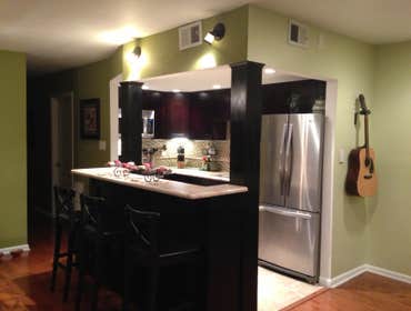 Modern Kitchen with Mocha Shaker RTA kitchen cabinets Adding Mocha Shaker kitchen cabinets transformed this small space into a beautiful modern kitchen