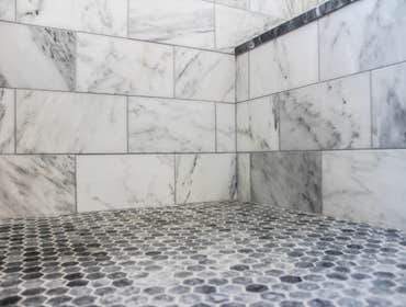 Baine Contracting Inc Project Multiple jobsites - showing kitchens, interior and exterior trim work, new homes, bathrooms, tile work, wood and iron ra