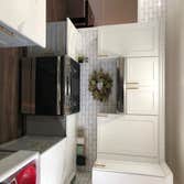 Stove side with subway tile wall