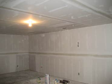 Project photos from Mueller Drywall & Construction These were pictures of a Customers Finished Basement.Was a Log Cabin Home, 75 pieces of 4x12 drywall