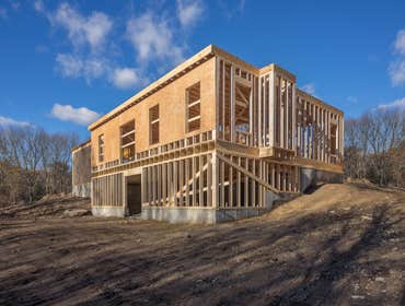 Photos by EOL Builders #64 Hillside construction, foundation and framing