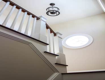 Baine Contracting Inc Project Multiple jobsites - showing kitchens, interior and exterior trim work, new homes, bathrooms, tile work, wood and iron ra